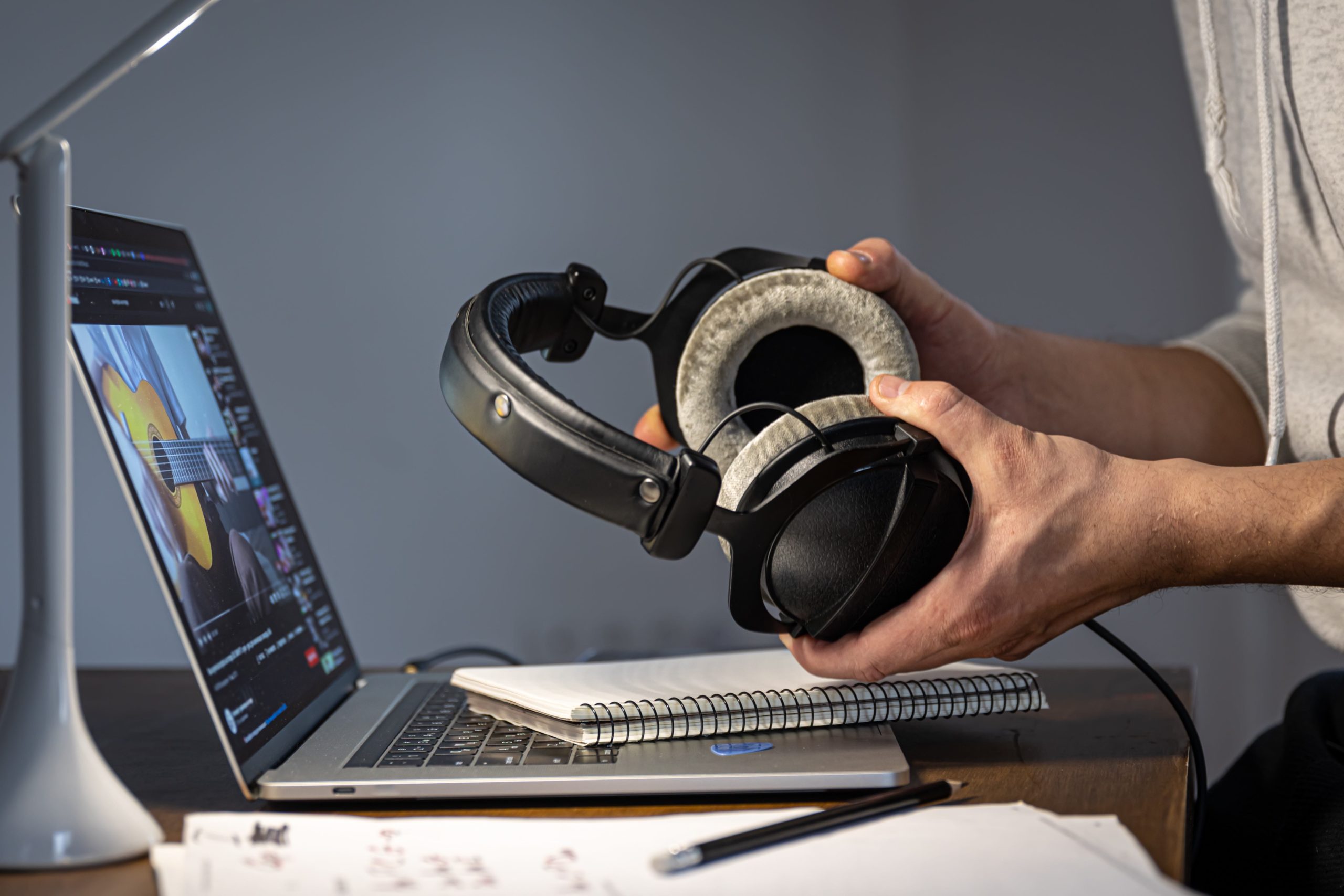 Working process at night, a musician is creating music at night.